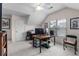 Bright bedroom with a ceiling fan, lots of furniture, and a window providing natural light at 535 Sugar Gate Ct, Lawrenceville, GA 30044