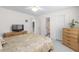 Bedroom with neutral color palette and multiple access doors at 535 Sugar Gate Ct, Lawrenceville, GA 30044