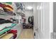 Spacious walk-in closet with shelving and ample storage space at 535 Sugar Gate Ct, Lawrenceville, GA 30044