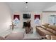 Bright living room with vaulted ceilings, fireplace, and access to the backyard at 535 Sugar Gate Ct, Lawrenceville, GA 30044