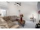 Spacious living room with vaulted ceiling, plush sectional sofa, and fireplace at 535 Sugar Gate Ct, Lawrenceville, GA 30044