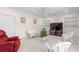 Comfortable room with recessed lighting, ceiling fan, and stylish wicker furniture at 535 Sugar Gate Ct, Lawrenceville, GA 30044