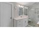 Bathroom featuring glass-enclosed shower and white vanity with sink and mirror at 2221 Shallowford Rd, Marietta, GA 30066
