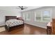 Spacious bedroom featuring hardwood floors and large windows with natural light at 2221 Shallowford Rd, Marietta, GA 30066