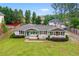 Charming, renovated ranch with a well-manicured lawn, brick exterior, and a new roof at 2221 Shallowford Rd, Marietta, GA 30066