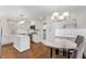 Beautiful, recently renovated kitchen featuring white cabinetry, stainless appliances, and a marble island at 2221 Shallowford Rd, Marietta, GA 30066