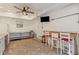Recreation room featuring counter seating, a television, and ample space at 2221 Shallowford Rd, Marietta, GA 30066