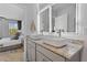 Bright bathroom featuring double vanity sinks and luxurious countertops at 225 Ivey Ter, Temple, GA 30179
