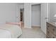 Bedroom featuring neutral paint, carpet, a closet, and a bed at 225 Ivey Ter, Temple, GA 30179