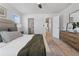 Bedroom showcasing natural light, a spacious layout, and a walk-in closet at 225 Ivey Ter, Temple, GA 30179