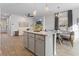 Open concept living area with modern decor, a decorative wall, and a dining area at 225 Ivey Ter, Temple, GA 30179