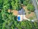 Aerial view of the property with a swimming pool and long driveway at 2652 Mount Tabor Church Rd, Dallas, GA 30157