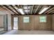 Basement featuring carpet, a walkout, and two windows that provide natural light at 2652 Mount Tabor Church Rd, Dallas, GA 30157