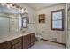 Bathroom featuring a vanity with a sink, toilet, wooden accents, and a shower with sliding doors at 2652 Mount Tabor Church Rd, Dallas, GA 30157
