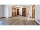Hardwood entryway leads into the home with stained wood doors and trim at 2652 Mount Tabor Church Rd, Dallas, GA 30157