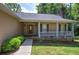 A charming front porch with stone accents and a lovely front door at 2652 Mount Tabor Church Rd, Dallas, GA 30157