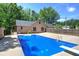 Backyard view showcasing the inground swimming pool with diving board and adjacent home at 2652 Mount Tabor Church Rd, Dallas, GA 30157