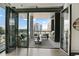 Chic outdoor living space on balcony, featuring comfortable seating, outdoor kitchen, and city views at 3107 Peachtree Ne Rd # 1005, Atlanta, GA 30305