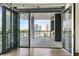 Balcony with an outdoor grill, city views, and folding glass doors at 3107 Peachtree Ne Rd # 1005, Atlanta, GA 30305
