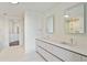 Bright bathroom featuring double vanities and a large walk-in closet at 3107 Peachtree Ne Rd # 1005, Atlanta, GA 30305