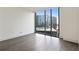 Bright bedroom with wood floors, city views and neutral paint at 3107 Peachtree Ne Rd # 1005, Atlanta, GA 30305