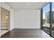 Bedroom featuring hardwood flooring and city views at 3107 Peachtree Ne Rd # 1005, Atlanta, GA 30305