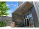 View of the building entrance showcasing modern architecture and valet services at 3107 Peachtree Ne Rd # 1005, Atlanta, GA 30305