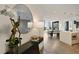 Bright foyer featuring hardwood floors and a view into the open living and dining area at 3107 Peachtree Ne Rd # 1005, Atlanta, GA 30305