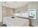 Gourmet kitchen featuring quartz countertops, custom cabinetry, and stainless steel appliances at 3107 Peachtree Ne Rd # 1005, Atlanta, GA 30305