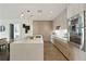 Sleek, modern kitchen features a large island, custom cabinetry, and stainless steel appliances at 3107 Peachtree Ne Rd # 1005, Atlanta, GA 30305