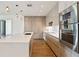 Modern kitchen with a large island, stainless steel appliances, and custom cabinets at 3107 Peachtree Ne Rd # 1005, Atlanta, GA 30305