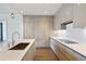 Kitchen featuring quartz countertops, modern cabinetry, and stainless steel appliances at 3107 Peachtree Ne Rd # 1005, Atlanta, GA 30305
