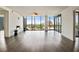 Bright living room boasts hardwood floors, fireplace, and expansive city views at 3107 Peachtree Ne Rd # 1005, Atlanta, GA 30305