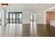 Open-concept living room boasts hardwood floors, floor-to-ceiling windows, and city views at 3107 Peachtree Ne Rd # 1005, Atlanta, GA 30305