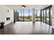 Bright living room featuring hardwood floors, modern lighting, and expansive city views at 3107 Peachtree Ne Rd # 1005, Atlanta, GA 30305