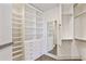 Spacious walk-in closet with custom shelving and ample storage at 3107 Peachtree Ne Rd # 1005, Atlanta, GA 30305