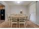 Dining room with seating for six around a wooden table at 5687 Highway 212, Covington, GA 30016