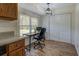 Compact office with window, desk, chair, and overhead lighting at 5687 Highway 212, Covington, GA 30016