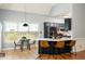 Charming kitchen with bar seating, tile floors, and stainless appliances at 1026 Lester Se Ave, Atlanta, GA 30316
