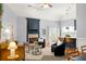 Bright living room featuring a fireplace, modern furnishings, and natural light from the french doors at 1026 Lester Se Ave, Atlanta, GA 30316