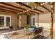 Inviting backyard patio with comfortable seating beneath a pergola, perfect for outdoor relaxation and entertaining at 1026 Lester Se Ave, Atlanta, GA 30316