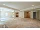Basement space with recessed lighting, bar, and open floorplan, awaiting your personal touch at 425 Fieldstone Lndg, Alpharetta, GA 30005