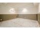 Spacious basement area featuring neutral colors and a decorative chair rail, offering plenty of customization potential at 425 Fieldstone Lndg, Alpharetta, GA 30005