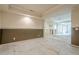 Unfinished basement showing neutral color palette, and doorway leading to other rooms, offering customization options at 425 Fieldstone Lndg, Alpharetta, GA 30005