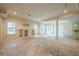 Partially finished basement area with recessed lights, multiple windows, bar area, and a large open floorplan at 425 Fieldstone Lndg, Alpharetta, GA 30005