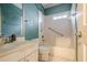 Bathroom with bathtub, toilet, vanity, and grab bars for accessibility at 425 Fieldstone Lndg, Alpharetta, GA 30005