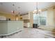 Kitchen with breakfast bar and window over the sink, open to dining area at 425 Fieldstone Lndg, Alpharetta, GA 30005