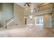 Spacious living room with a staircase and second-floor landing at 425 Fieldstone Lndg, Alpharetta, GA 30005