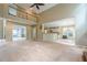 Open living space with a view of the kitchen and dining room on two sides at 425 Fieldstone Lndg, Alpharetta, GA 30005