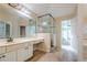 Large ensuite bathroom featuring a bathtub, separate glass shower, and large vanity area at 425 Fieldstone Lndg, Alpharetta, GA 30005
